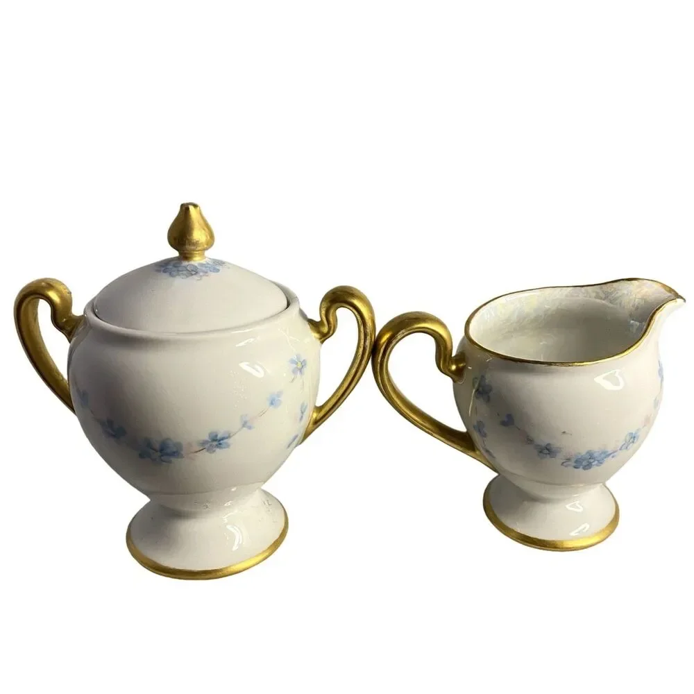 #8191 VINTAGE MADE IN JAPAN SUGAR BOWL AND CREAMER WITH LIGHT BLUE FLOWERS